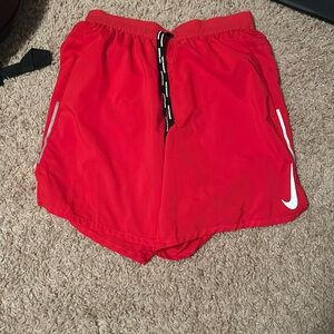 Red Nike shorts